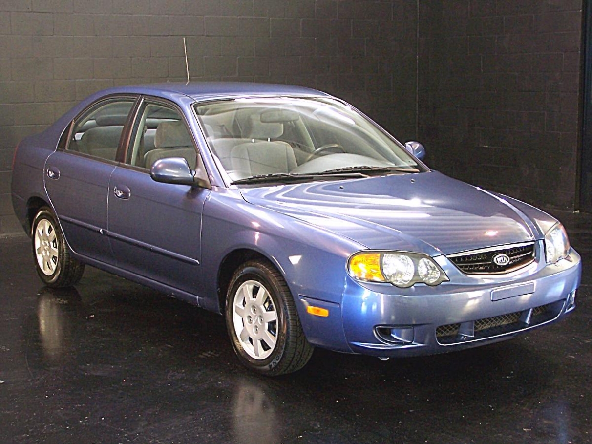 Шины и диски для Kia Spectra 2003, размер колёс на Киа Спектра 2003